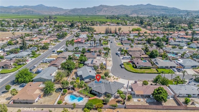 25810 San Felipe Dr, Hemet, CA 92544 - aerial view of property and surrounding area with a mountain backdrop and nearby suburban area
