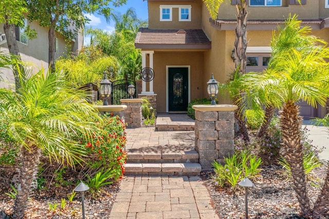 8550 Alexandria St, Riverside, CA 92508 - doorway to property featuring stucco siding