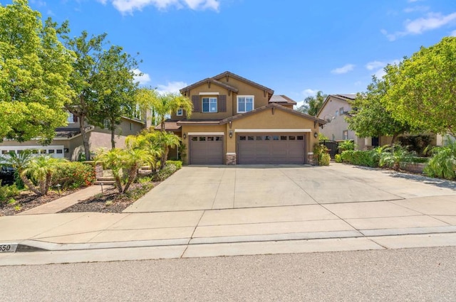 8550 Alexandria St, Riverside, CA 92508 - craftsman house with stucco siding, concrete driveway, and a garage