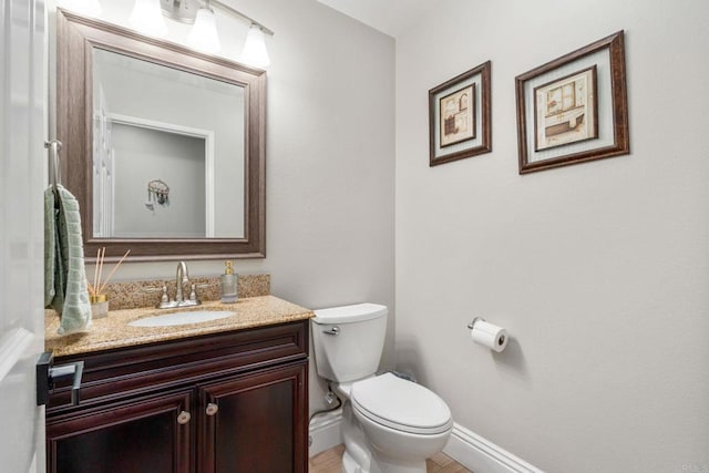 8550 Alexandria St, Riverside, CA 92508 - bathroom featuring vanity, toilet, and baseboards