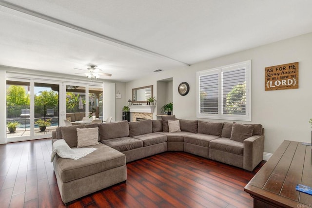 8550 Alexandria St, Riverside, CA 92508 - living area featuring ceiling fan, dark wood finished floors, and a fireplace
