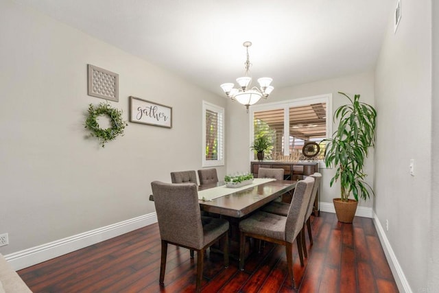 8550 Alexandria St, Riverside, CA 92508 - dining area featuring a chandelier, dark wood-style floors, and baseboards