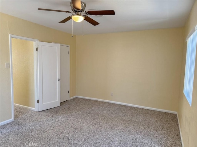 812 Wilson Ave, Bakersfield, CA 93308 - unfurnished bedroom with carpet floors, baseboards, and a ceiling fan