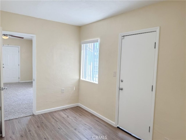 812 Wilson Ave, Bakersfield, CA 93308 - unfurnished room with wood finished floors, baseboards, and ceiling fan