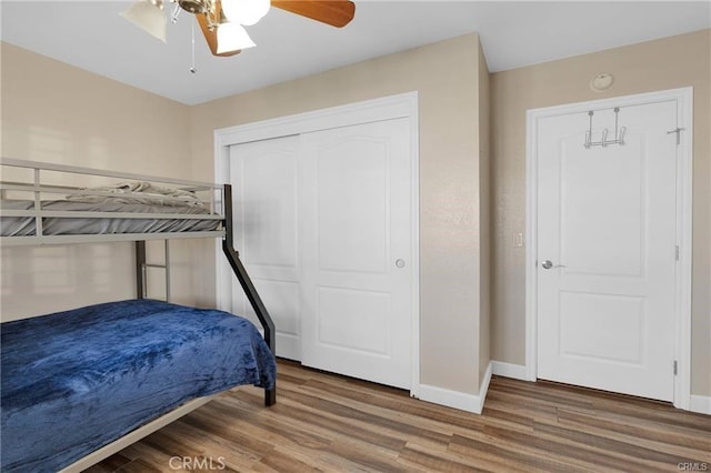 19055 Seaforth St, Hesperia, CA 92345 - bedroom featuring wood finished floors, baseboards, a ceiling fan, and a closet
