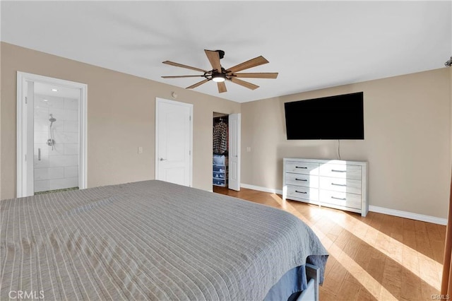 19055 Seaforth St, Hesperia, CA 92345 - bedroom featuring wood finished floors, baseboards, ceiling fan, and ensuite bathroom