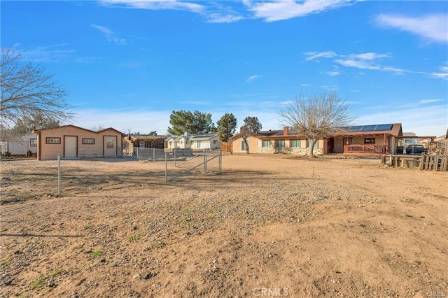 19055 Seaforth St, Hesperia, CA 92345 - view of yard with a garage and a gate