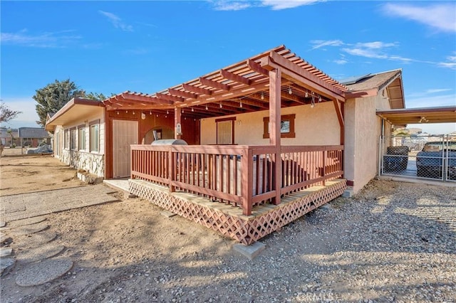 19055 Seaforth St, Hesperia, CA 92345 - back of property featuring stucco siding, a pergola, and a tile roof
