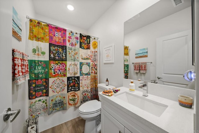 3001 Bravo Loop Unit 1, Chula Vista, CA 91915 - bathroom featuring vanity, wood finished floors, toilet, shower / tub combo, and recessed lighting