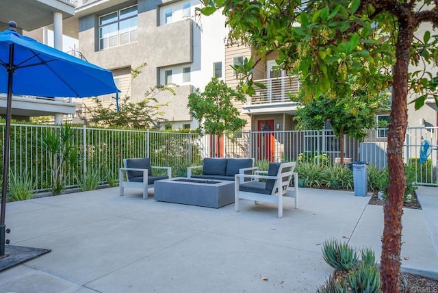 3001 Bravo Loop Unit 1, Chula Vista, CA 91915 - view of patio / terrace with an outdoor living space with a fire pit