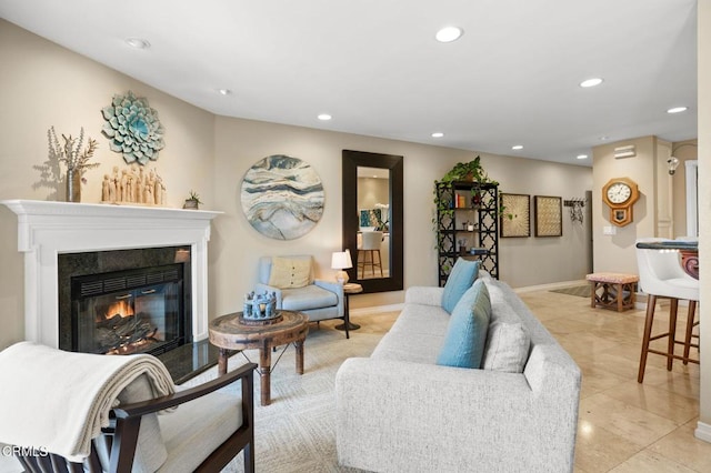 2623 Antonio Dr Unit 104, Camarillo, CA 93010 - living room with recessed lighting, a glass covered fireplace, baseboards, and light tile patterned floors