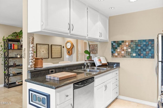 2623 Antonio Dr Unit 104, Camarillo, CA 93010 - kitchen featuring appliances with stainless steel finishes, a sink, light tile patterned floors, white cabinetry, and recessed lighting