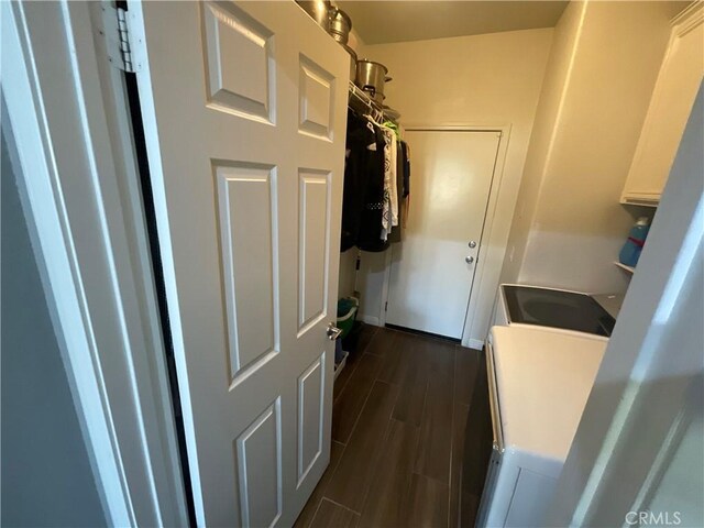31728 Pompei Ln, Winchester, CA 92596 - laundry room featuring washing machine and dryer and dark wood-style flooring