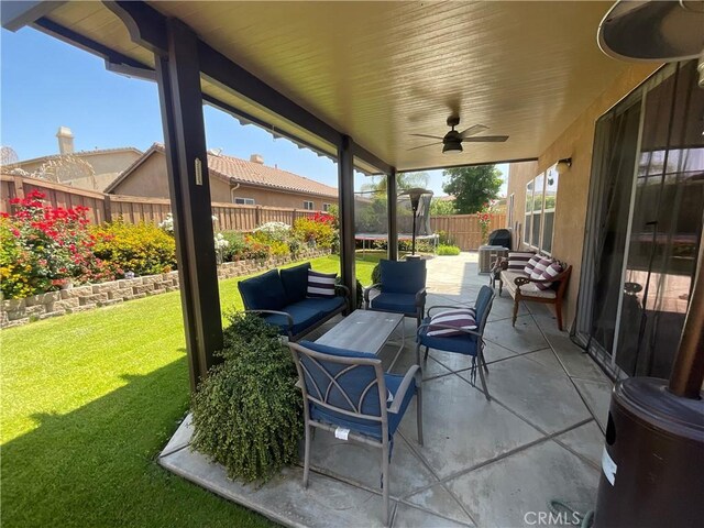 31728 Pompei Ln, Winchester, CA 92596 - view of patio / terrace with a trampoline, an outdoor hangout area, and a ceiling fan