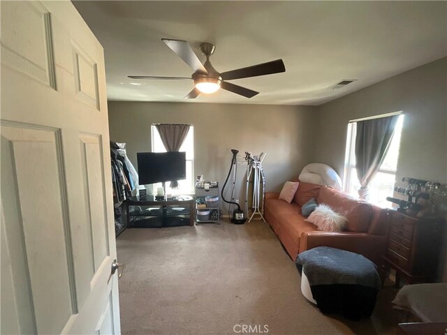 31728 Pompei Ln, Winchester, CA 92596 - living area featuring carpet floors and a ceiling fan