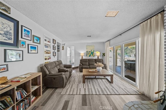 40901 Gibbel Rd, Hemet, CA 92544 - living room with wood finished floors and a textured ceiling