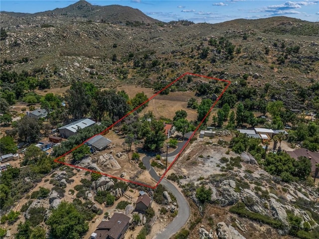 40901 Gibbel Rd, Hemet, CA 92544 - aerial view of property and surrounding area featuring a mountainous background and property parcel outlined