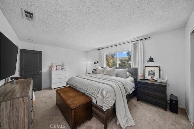 40901 Gibbel Rd, Hemet, CA 92544 - bedroom featuring light colored carpet and a textured ceiling