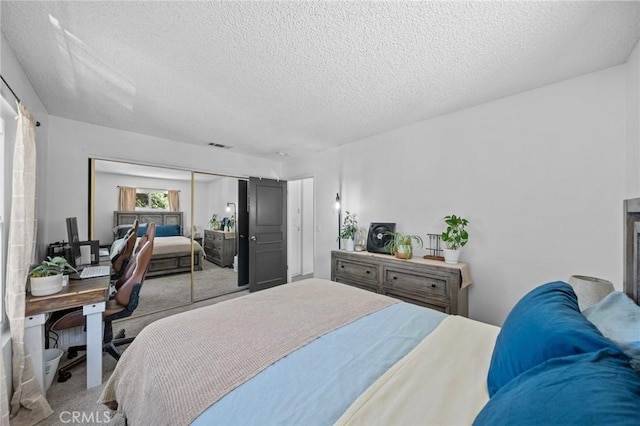 40901 Gibbel Rd, Hemet, CA 92544 - carpeted bedroom featuring a textured ceiling