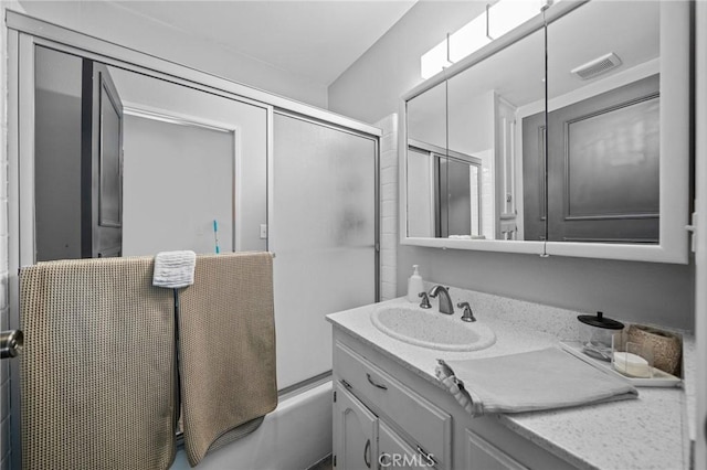 40901 Gibbel Rd, Hemet, CA 92544 - bathroom with vanity and combined bath / shower with glass door