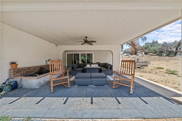 40901 Gibbel Rd, Hemet, CA 92544 - view of patio featuring an outdoor living space and a ceiling fan