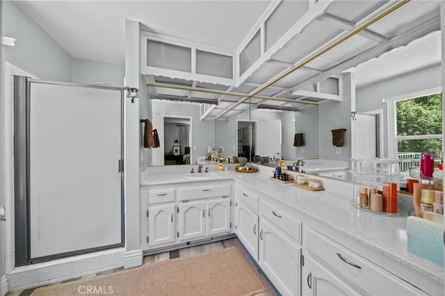 40901 Gibbel Rd, Hemet, CA 92544 - full bath featuring a shower stall, vanity, and wood finished floors