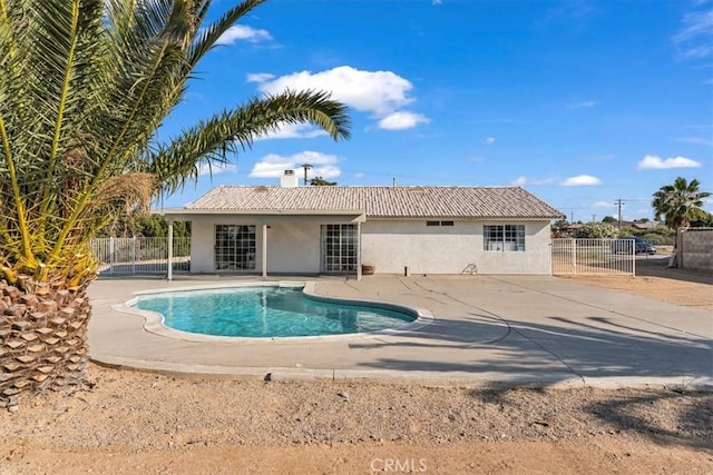 17660 Seaforth St, Hesperia, CA 92345 - view of swimming pool with a patio area and a gate