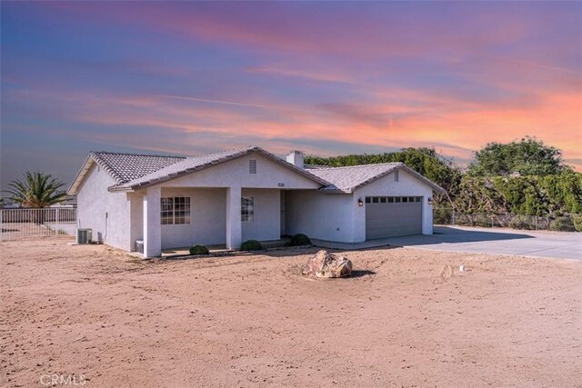 17660 Seaforth St, Hesperia, CA 92345 - single story home with an attached garage, concrete driveway, a tile roof, and stucco siding