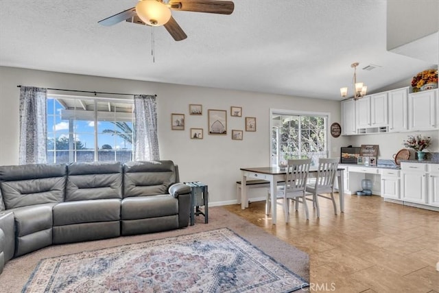 17660 Seaforth St, Hesperia, CA 92345 - living area with a ceiling fan and a textured ceiling