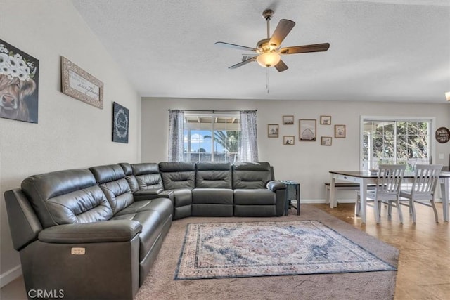 17660 Seaforth St, Hesperia, CA 92345 - living area featuring healthy amount of natural light, a ceiling fan, and a textured ceiling