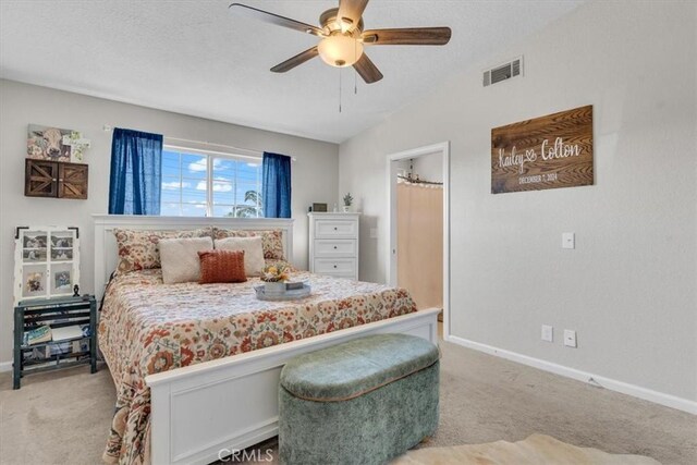 17660 Seaforth St, Hesperia, CA 92345 - bedroom with light colored carpet, a ceiling fan, and vaulted ceiling