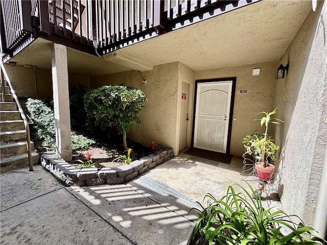 3513 Caminito Sierra Unit 101, Carlsbad, CA 92009 - entrance to property with stucco siding and a patio area
