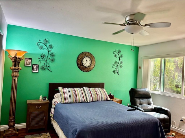 3513 Caminito Sierra Unit 101, Carlsbad, CA 92009 - bedroom featuring wood finished floors, baseboards, and ceiling fan