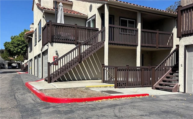 3513 Caminito Sierra Unit 101, Carlsbad, CA 92009 - view of building exterior with stairway
