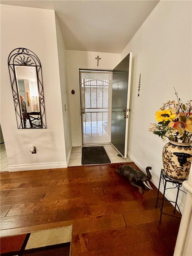 3513 Caminito Sierra Unit 101, Carlsbad, CA 92009 - entryway featuring light wood finished floors and baseboards