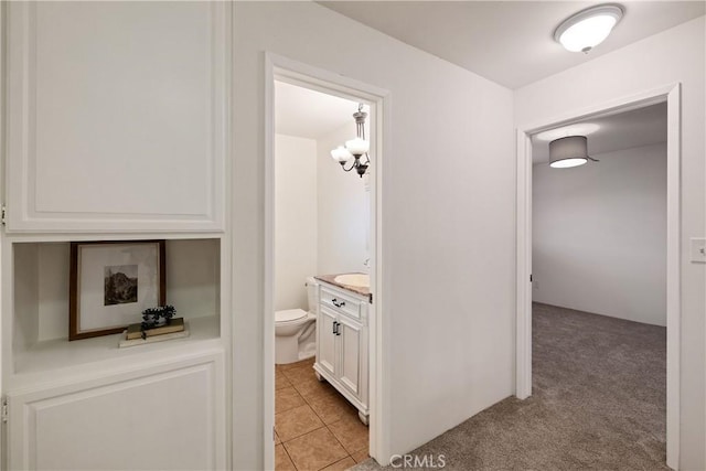 20310 Anza Ave Unit O, Torrance, CA 90503 - hallway featuring light tile patterned floors