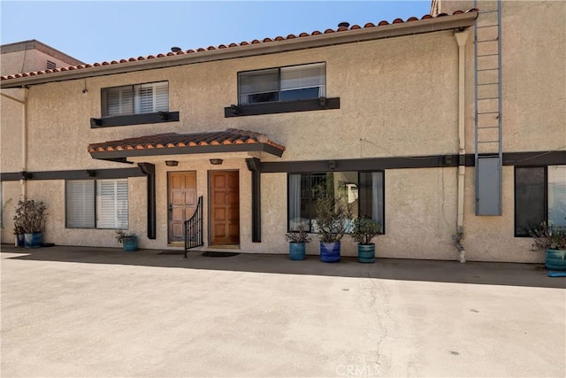 20310 Anza Ave Unit O, Torrance, CA 90503 - view of front of property with stucco siding and a tiled roof