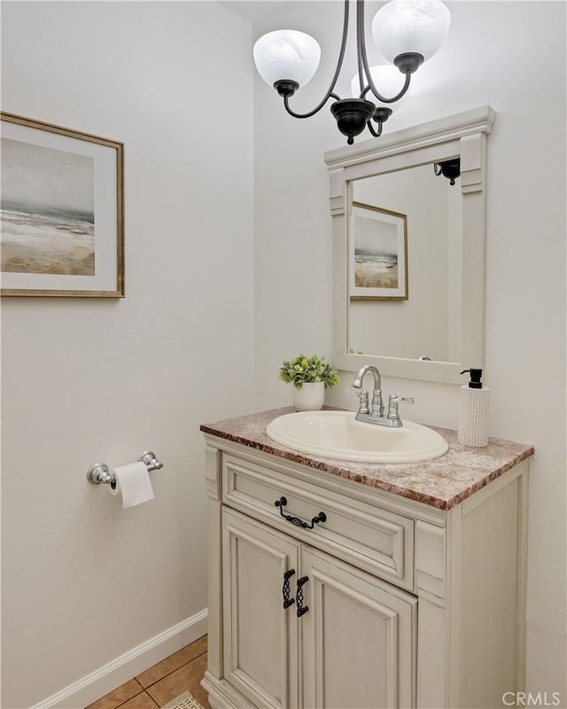 20310 Anza Ave Unit O, Torrance, CA 90503 - bathroom with vanity, tile patterned floors, baseboards, and a chandelier