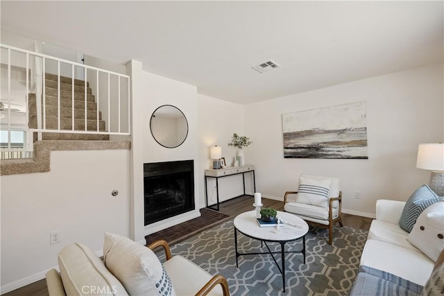 20310 Anza Ave Unit O, Torrance, CA 90503 - living area with baseboards, wood finished floors, and a fireplace