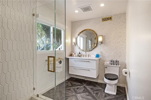 3721 Glenridge Dr, Sherman Oaks, CA 91423 - bathroom with vanity, toilet, baseboards, a stall shower, and wallpapered walls