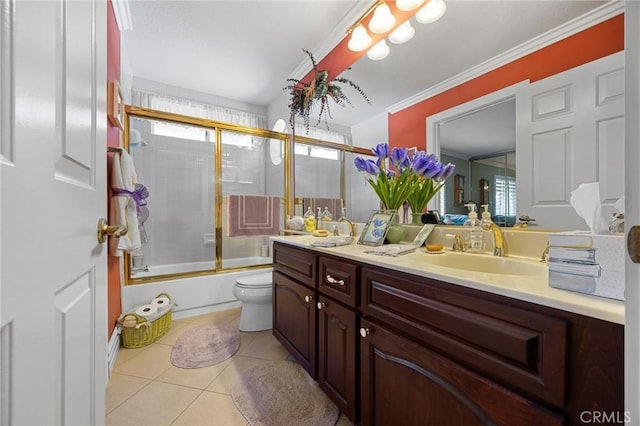 10750 Orchard View Ln, Riverside, CA 92503 - full bath featuring double vanity, toilet, tile patterned flooring, bath / shower combo with glass door, and ornamental molding