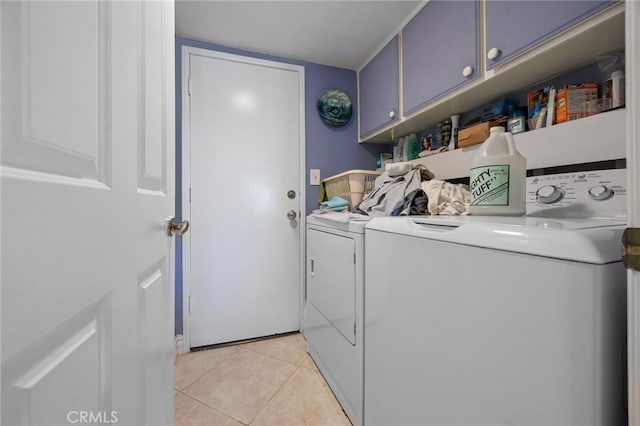 10750 Orchard View Ln, Riverside, CA 92503 - washroom with separate washer and dryer, cabinet space, and light tile patterned floors
