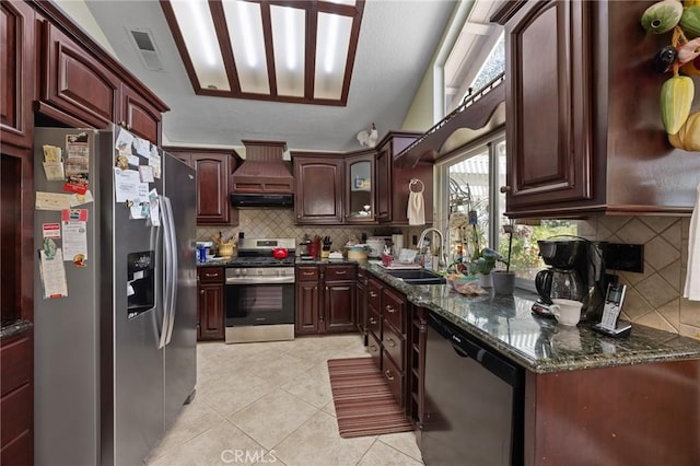 10750 Orchard View Ln, Riverside, CA 92503 - kitchen featuring appliances with stainless steel finishes, a sink, backsplash, under cabinet range hood, and custom exhaust hood