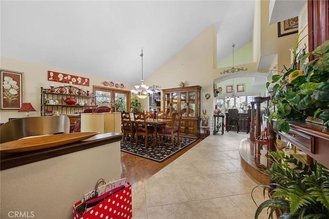 10750 Orchard View Ln, Riverside, CA 92503 - dining room featuring tile patterned floors, a chandelier, and high vaulted ceiling