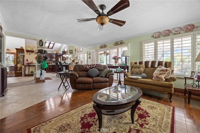 10750 Orchard View Ln, Riverside, CA 92503 - living area with ornamental molding, healthy amount of natural light, a textured ceiling, ceiling fan, and light wood finished floors