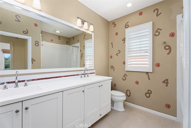 104 Working, Irvine, CA 92602 - full bathroom featuring double vanity, toilet, a shower with curtain, tile patterned flooring, and baseboards