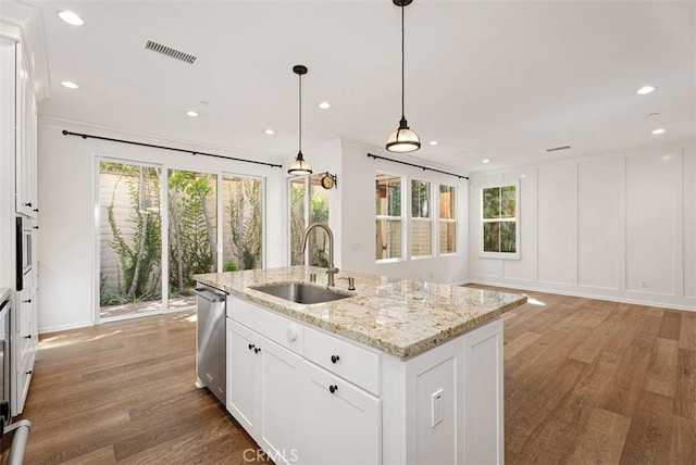 104 Working, Irvine, CA 92602 - kitchen featuring a sink, stainless steel dishwasher, light wood-type flooring, white cabinetry, and recessed lighting