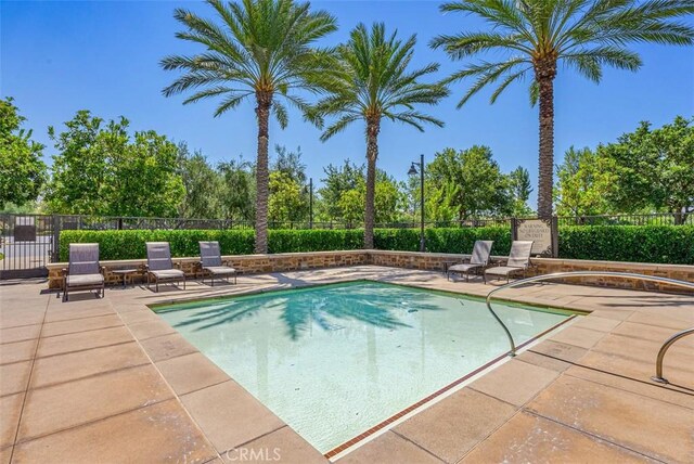 104 Working, Irvine, CA 92602 - view of swimming pool featuring a patio area