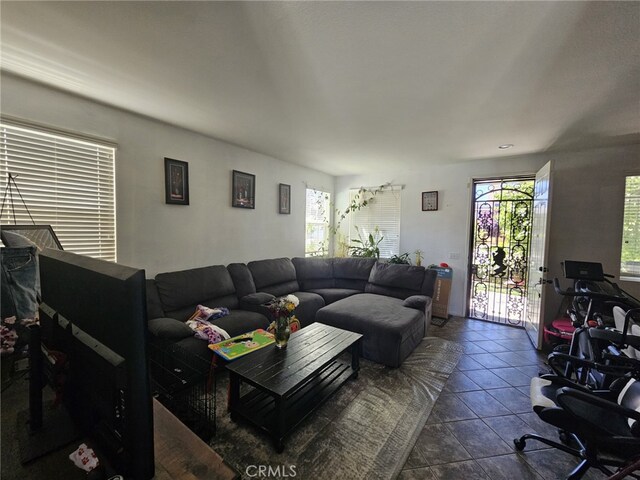 12912 Newport St, Hesperia, CA 92344 - living room featuring dark tile patterned floors
