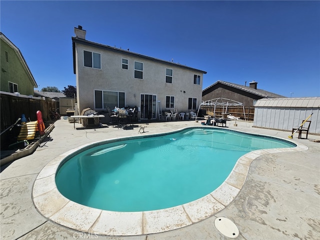 12912 Newport St, Hesperia, CA 92344 - view of swimming pool with a fenced backyard and a patio